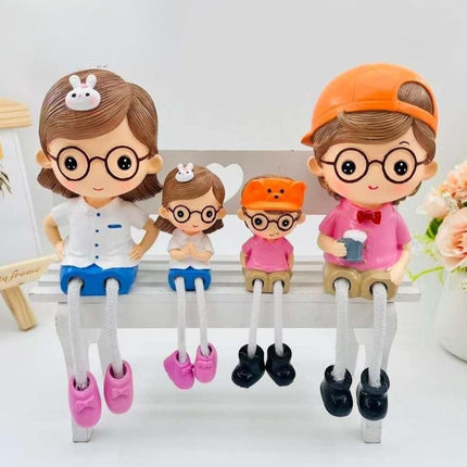 PCTKART Cute Family Sitting Figurines with Hanging Legs | Polyresin Home Decor Showpiece for Living Room, Bedroom & Office (Set of 4) - Pctkart