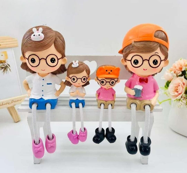 PCTKART Cute Family Sitting Figurines with Hanging Legs | Polyresin Home Decor Showpiece for Living Room, Bedroom & Office (Set of 4) - Pctkart