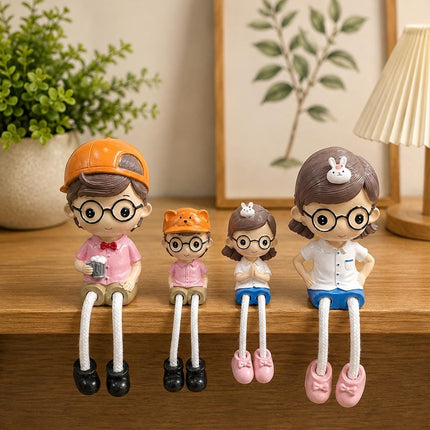 PCTKART Cute Family Sitting Figurines with Hanging Legs | Polyresin Home Decor Showpiece for Living Room, Bedroom & Office (Set of 4) - Pctkart