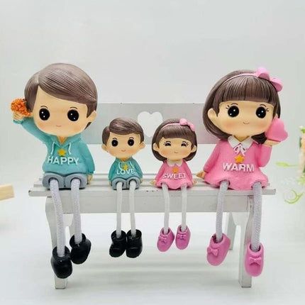 PCTKART Cute Sitting Family Figurines with Hanging Legs | Polyresin Home Decor Showpiece for Living Room, Bedroom & Office (Set of 4) - Pctkart